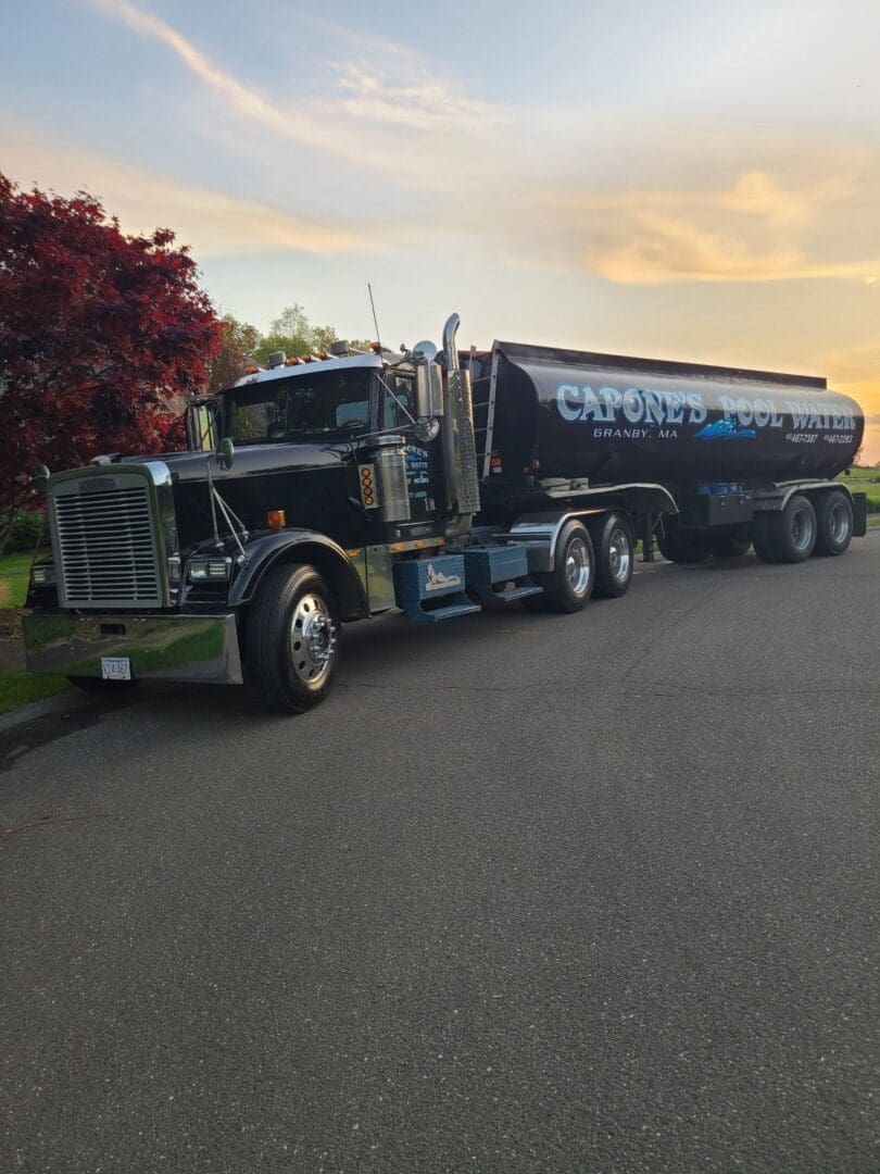 A large truck is parked on the side of the road.